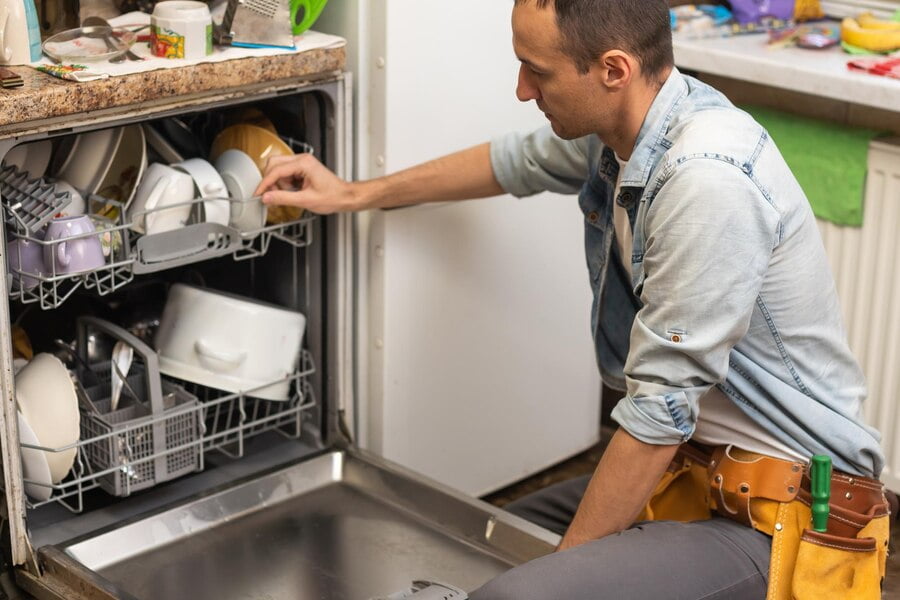 Dishwasher repairs technician